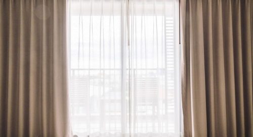 How Long Should Curtains Hang Below Window Sill