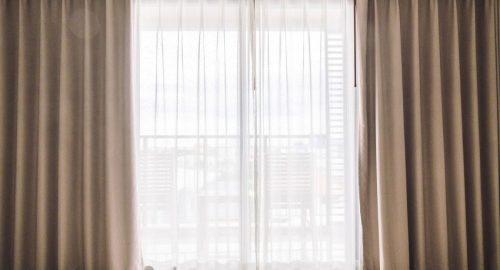 How Long Should Curtains Hang Below Window Sill