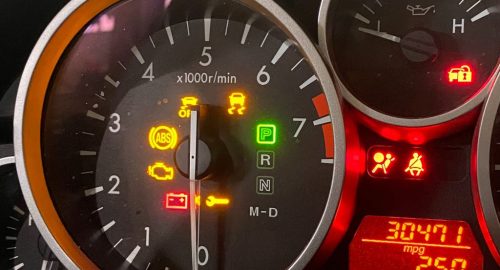 Car dashboard lights on but engine won’t start, illustrating troubleshooting steps for a no-start vehicle