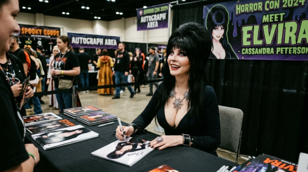 Elvira actress Cassandra Peterson signing autographs at a horror convention